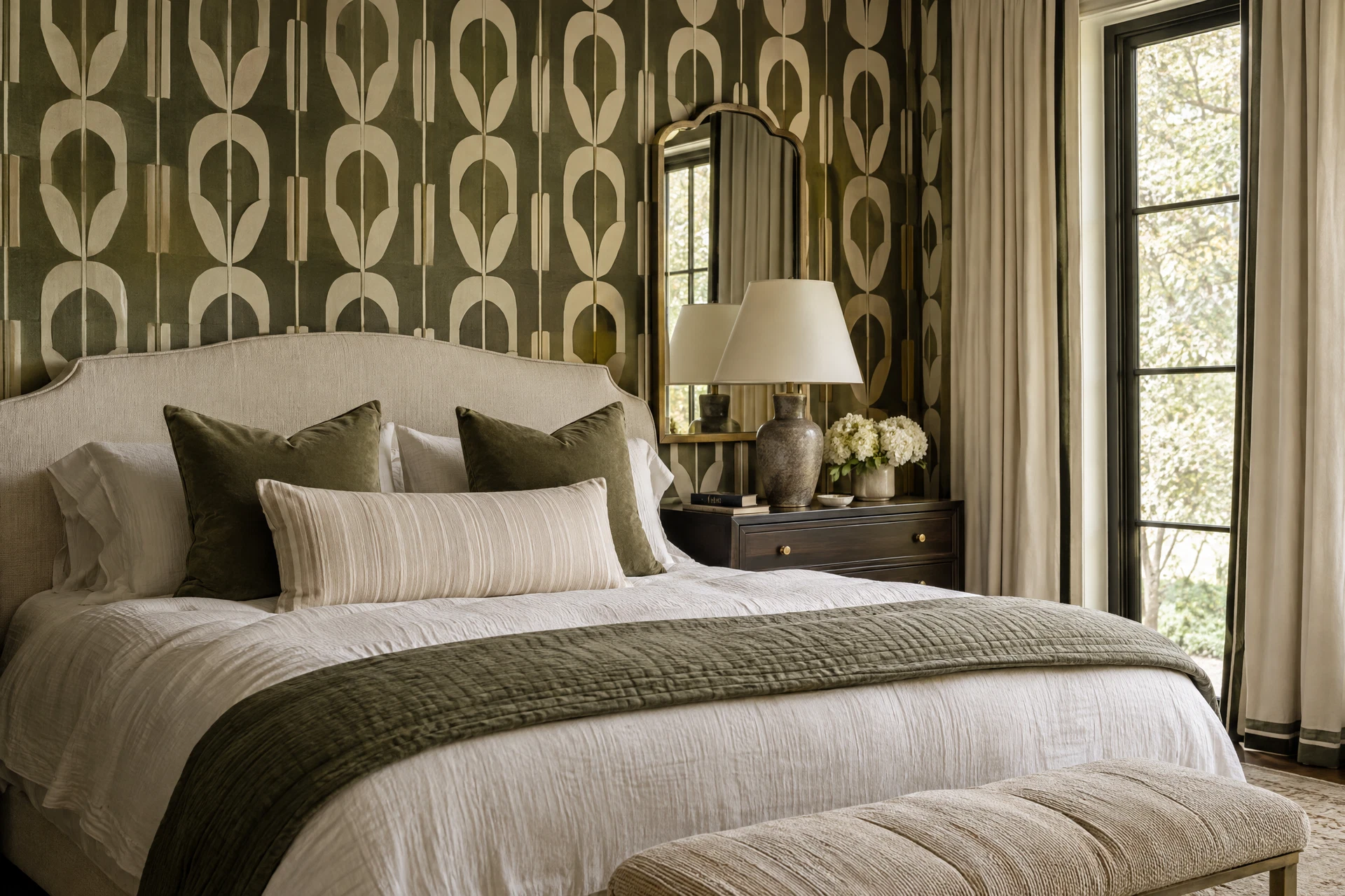 Deep olive geometric wallpaper in a tailored bedroom